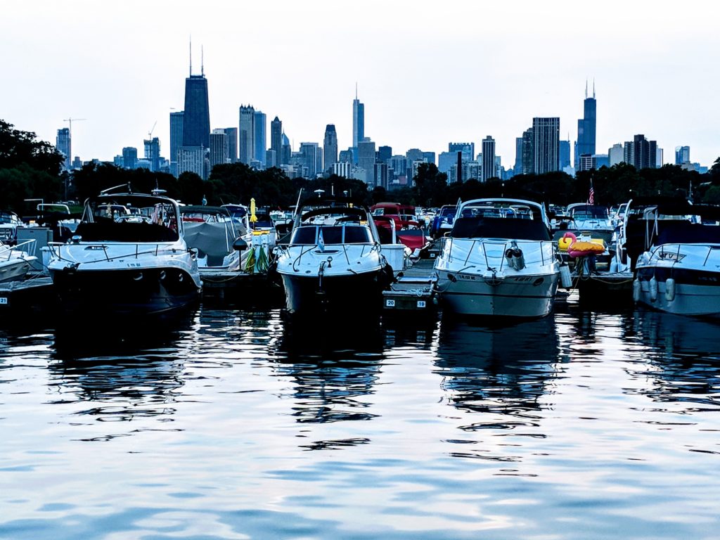 Montrose Harbor - Chicago - Boats parked in harbor, Chicago skyline in background